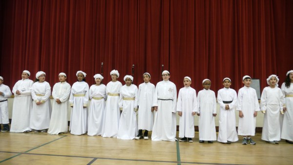 This photo shows students performing at the Dar al-Rahman Awards Ceremony.